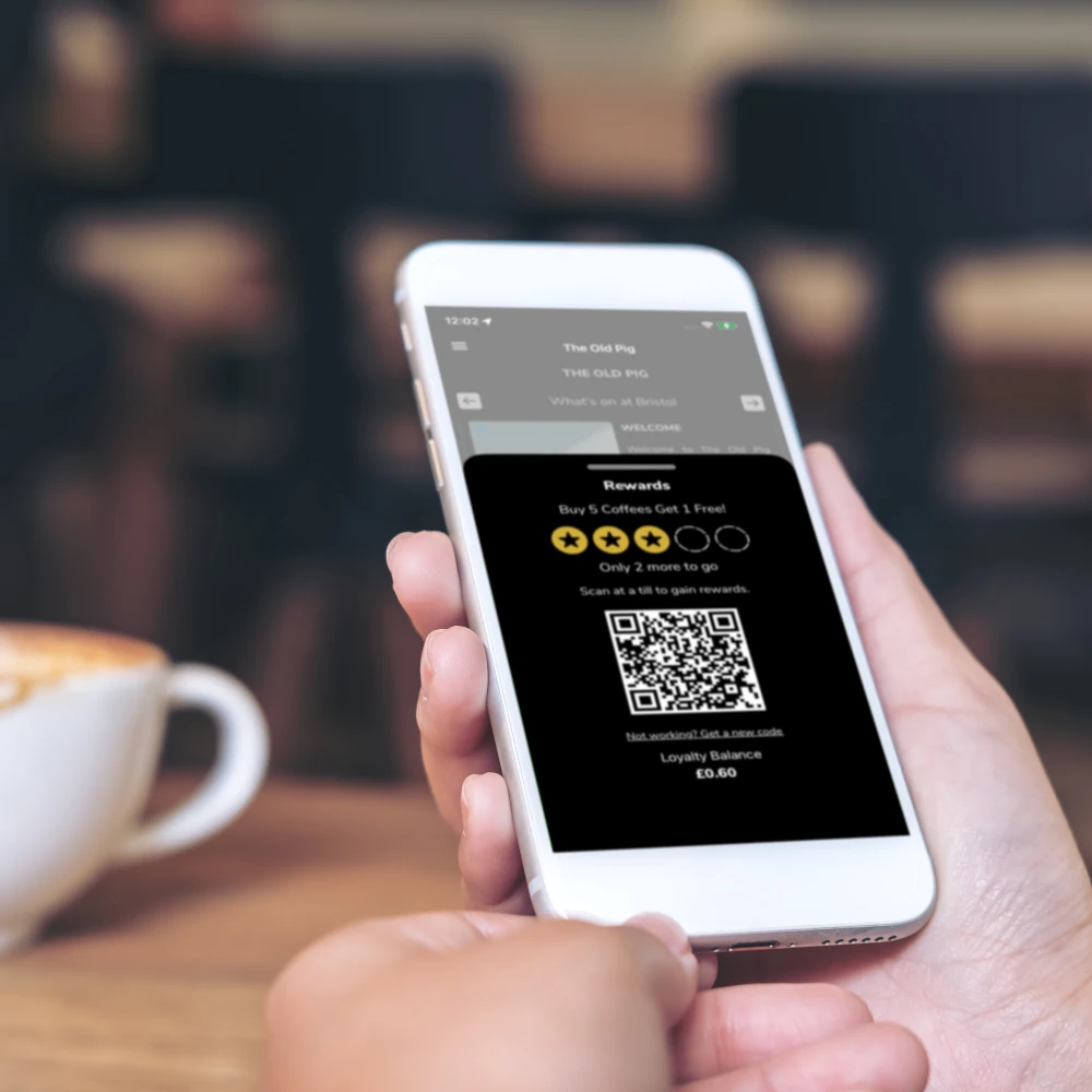 A rewards QR code on a mobile phone